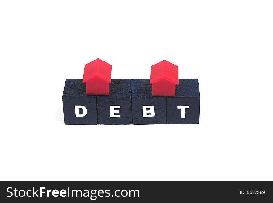 Some red houses on the word debt. Some red houses on the word debt