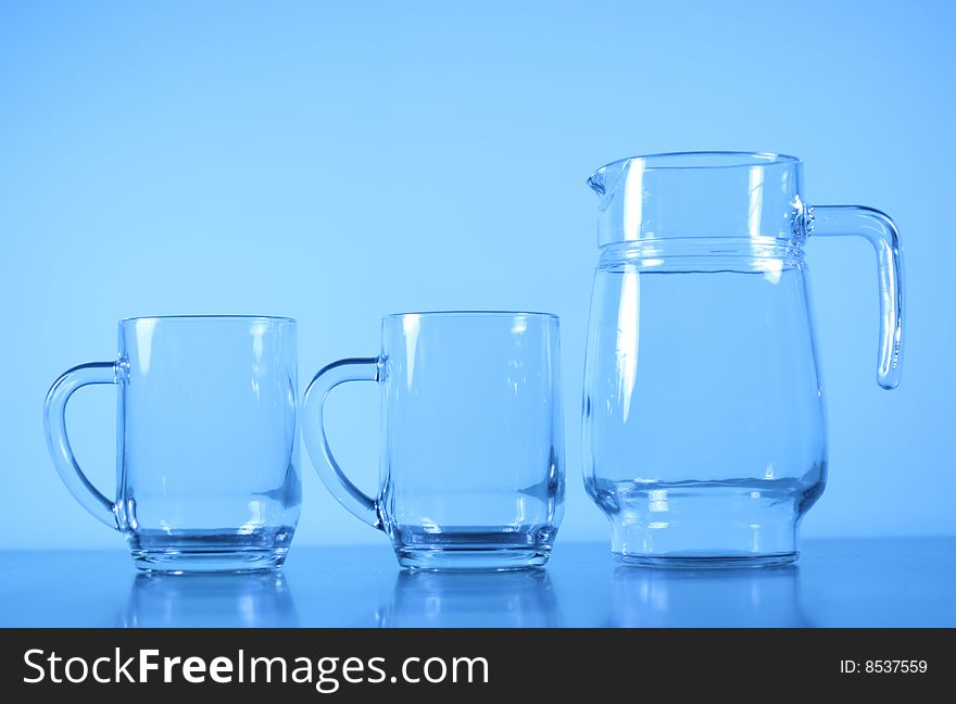 An empty glass in blue background.