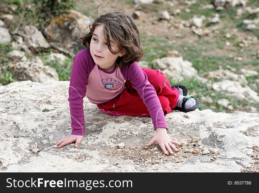 Little Girl On The Rock