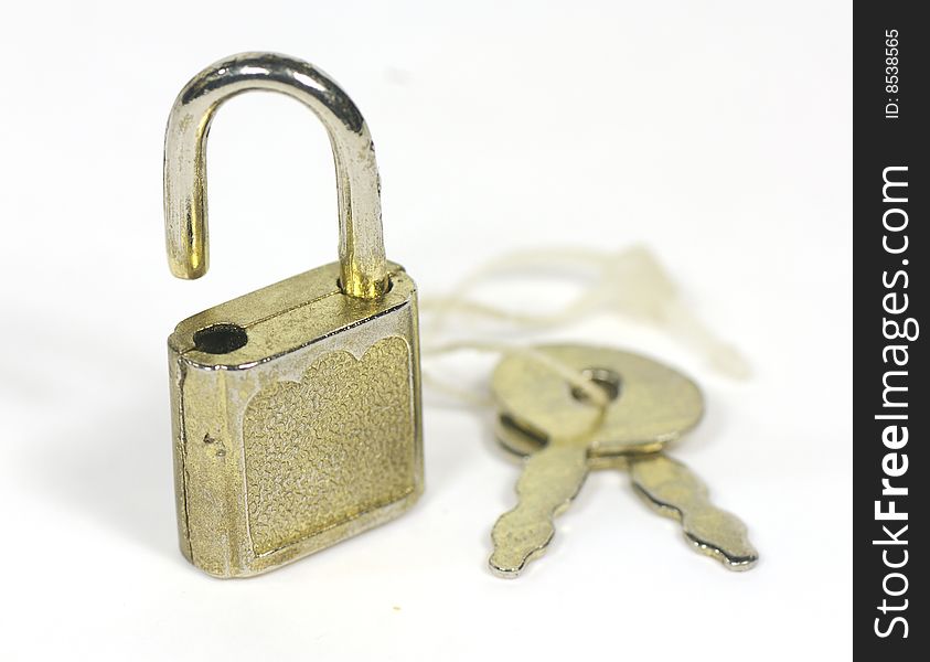 Tiny lock with key for valise on white background