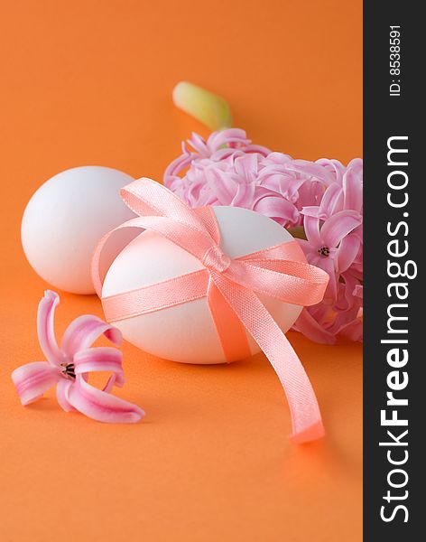 Easter Eggs On An Orange Background