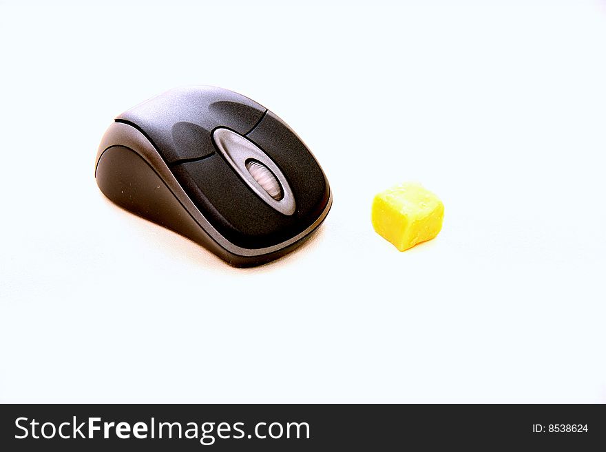 Cordless computer mouse with cheese on white