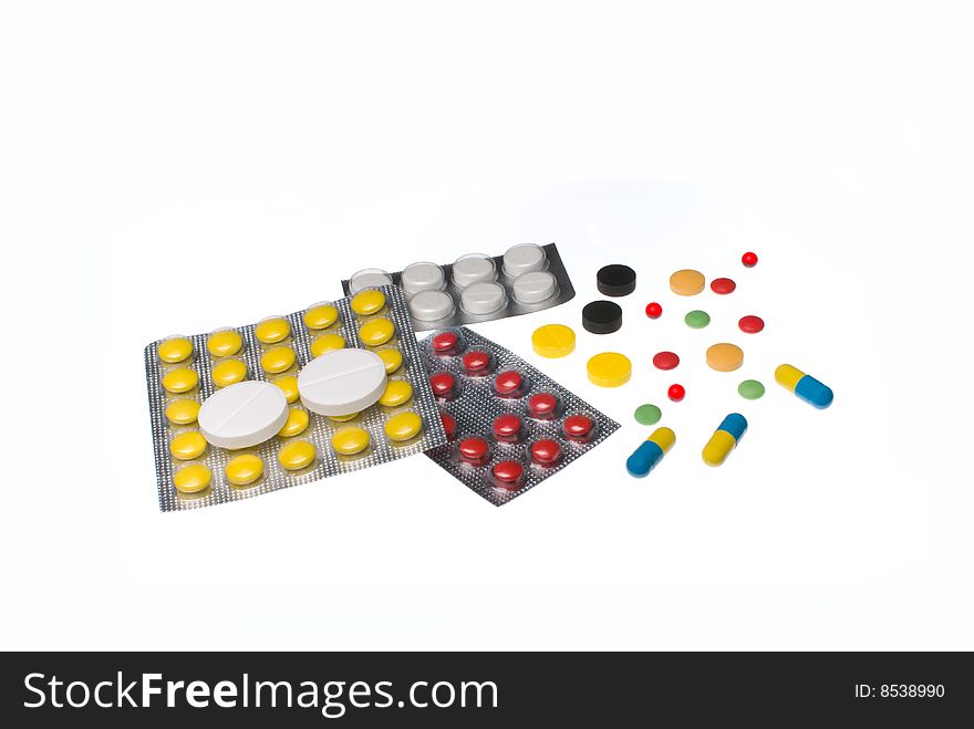 Pills and tablets isolated on white background