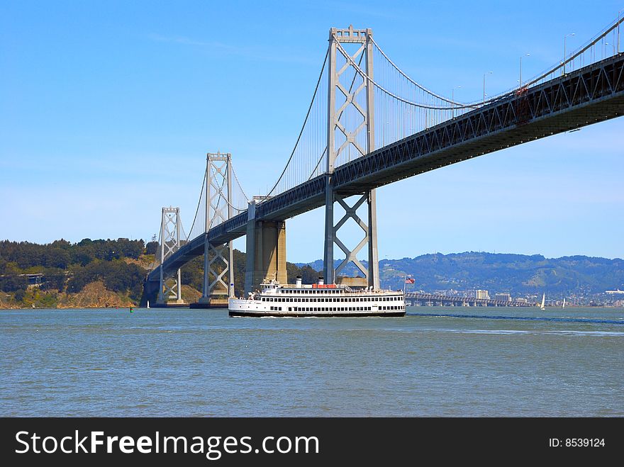 Bay bridge against blue sky background