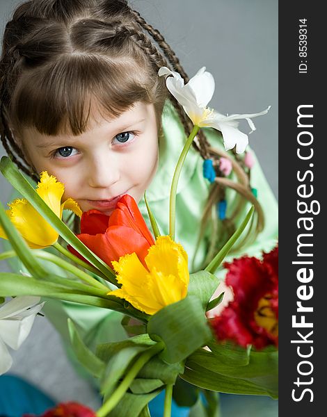 Stock photo: an image of a girl with a bouquet. Stock photo: an image of a girl with a bouquet