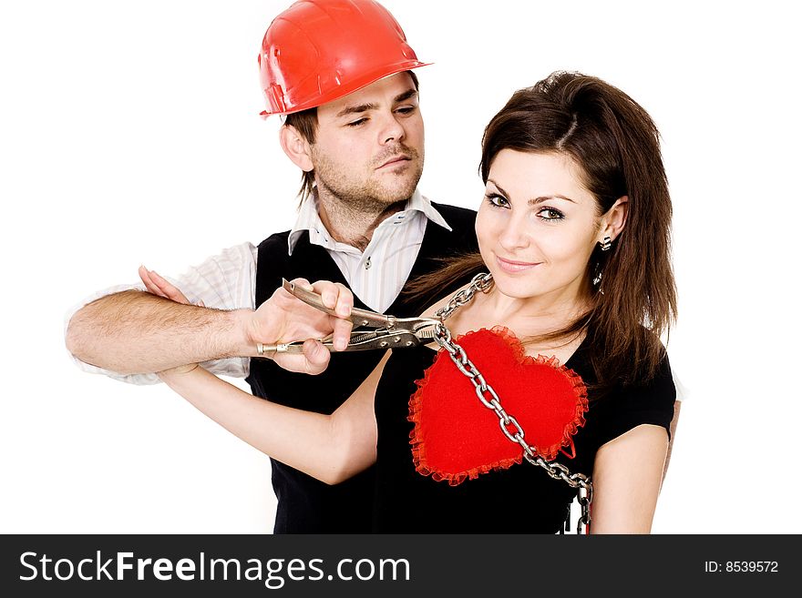 Stock photo: an image of a woman with heart and  a man with pliers. Stock photo: an image of a woman with heart and  a man with pliers