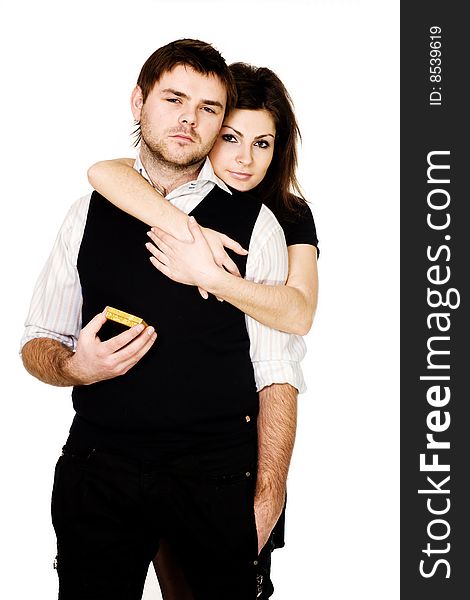 Stock photo: an image of a man with present and woman behind him. Stock photo: an image of a man with present and woman behind him