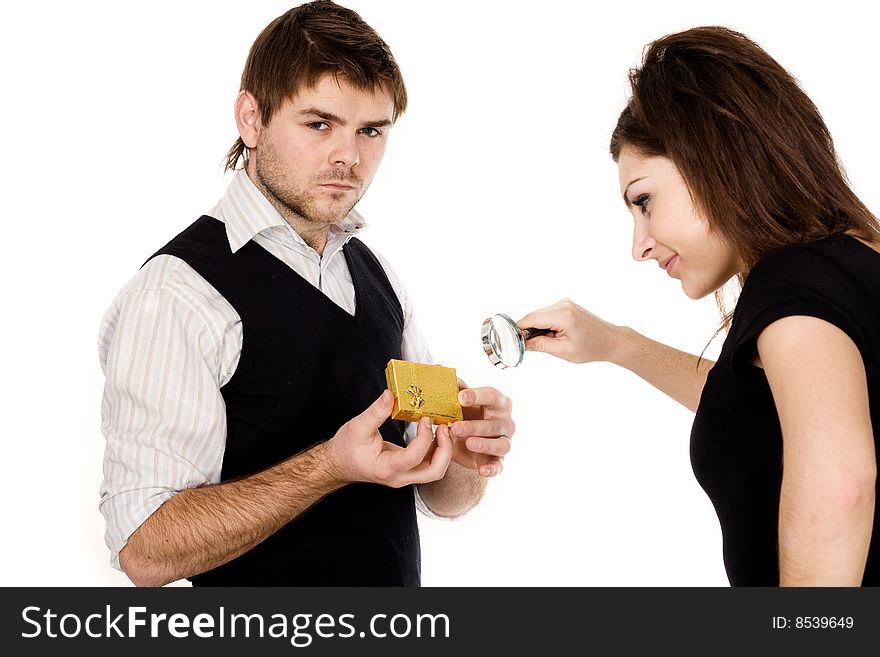 Stock photo: an image of a man with present and woman with magnifier