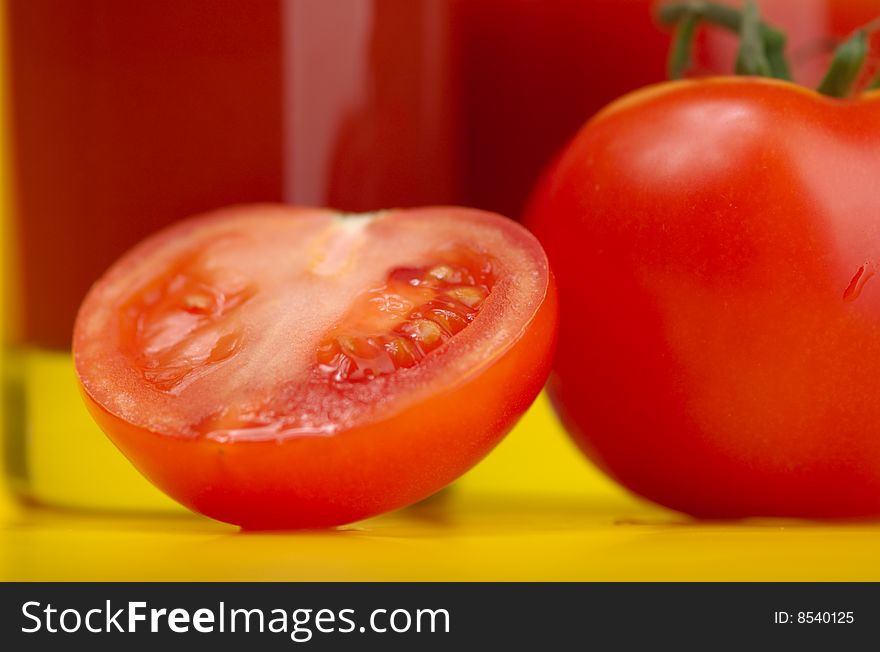 Fresh juicy tomatoes and окал tomato juice