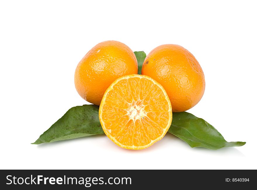 Ripe juicy tangerines on a white background