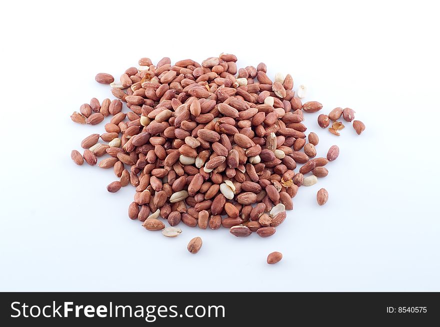 Batch of peanuts isolated on white
