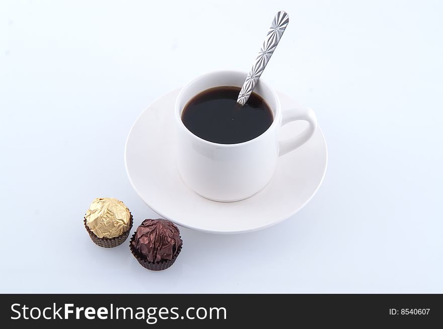 Cup of coffee with chocolate sweet. Cup of coffee with chocolate sweet