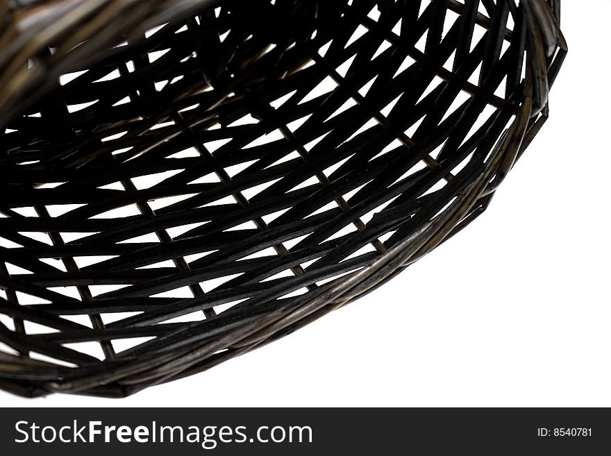 Close up of an empty basket on white background. Lit from behind to eliminate shadows.