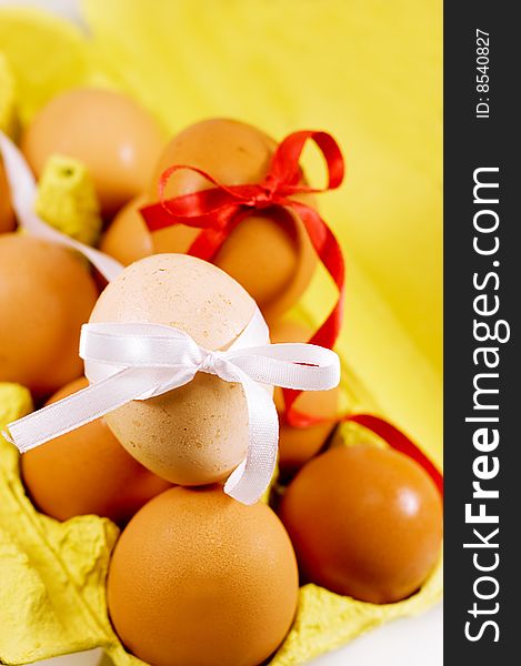 Eggs with red and white baw, easter concept. Eggs with red and white baw, easter concept