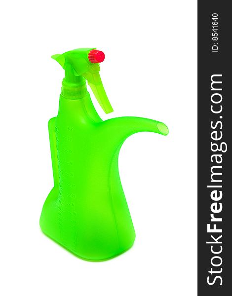 Green watering can on a white background