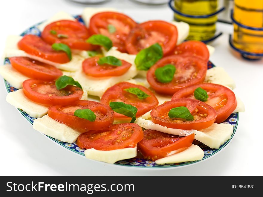 Fresh salad with tomato and mozzarella.