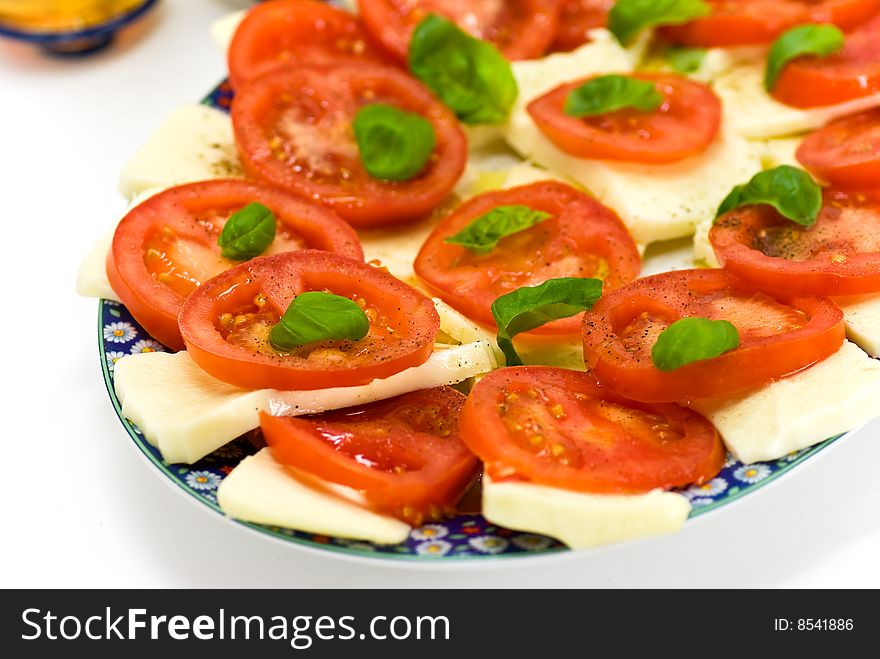 Fresh salad with tomato and mozzarella