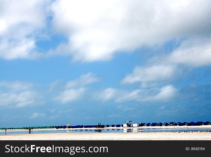 Beach With Rows Of Shade Chairs