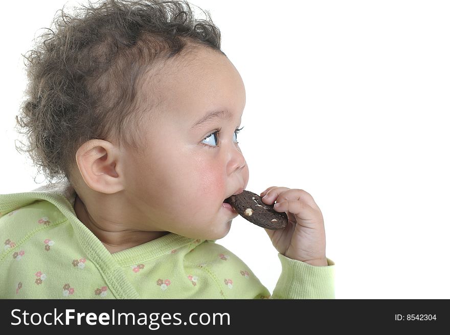 Nice isolated portrait of a little girl with cookie. Nice isolated portrait of a little girl with cookie