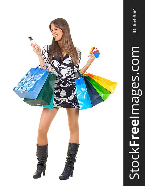 Happy Young Woman With Shopping Bags Isolated