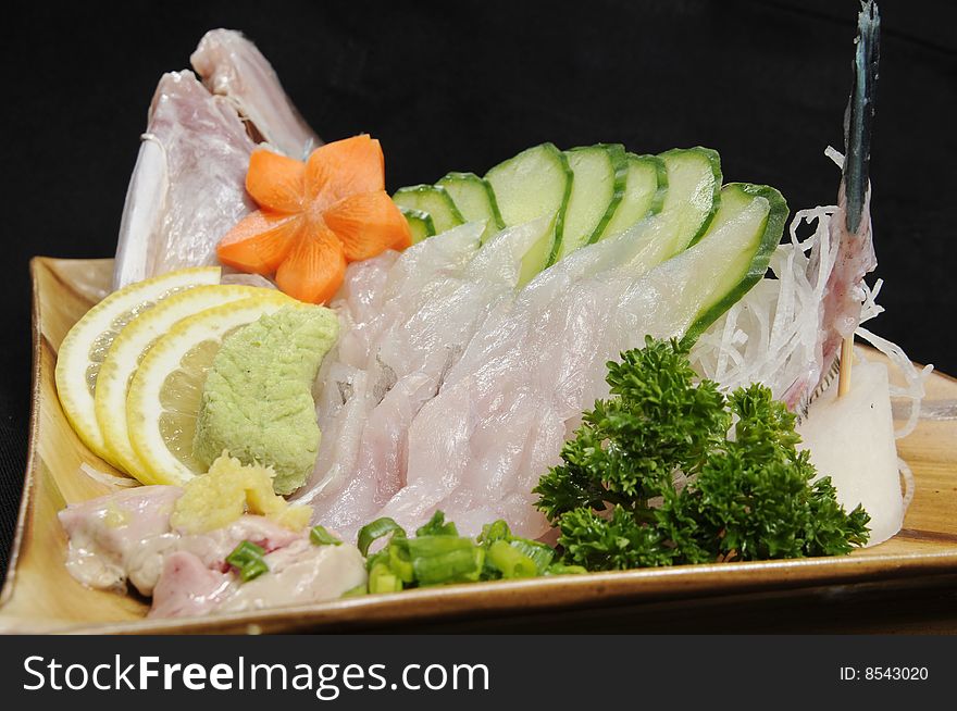 Japanese sashimi on a white dish