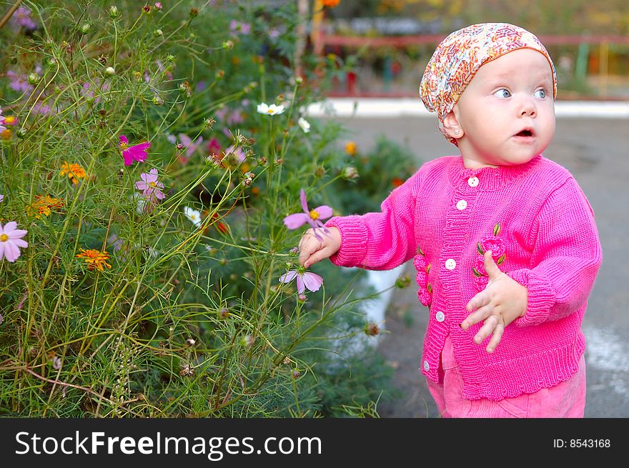 Pretty Little Girl With Flowers.