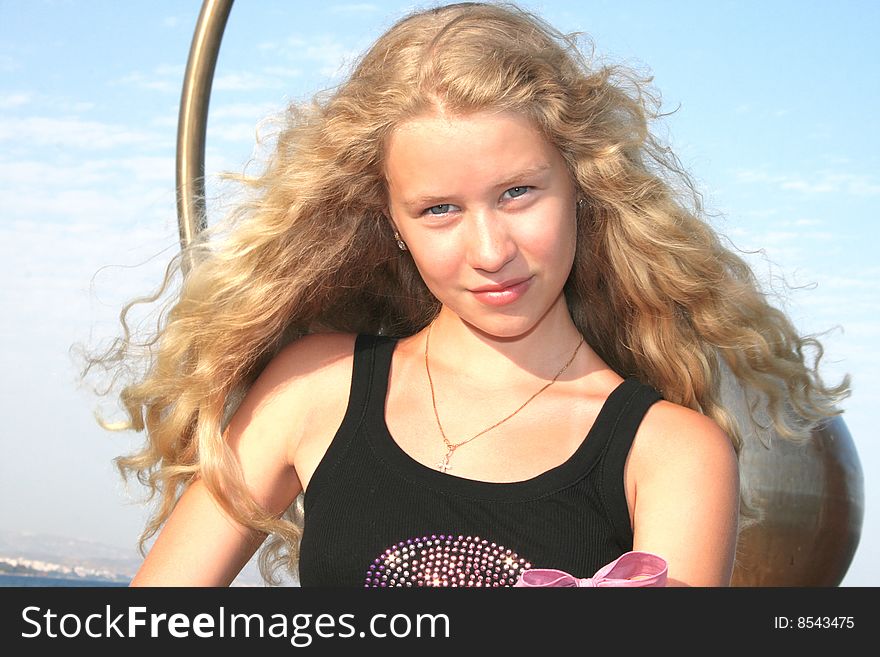 Pretty blond freckled girl with long hair. Pretty blond freckled girl with long hair.