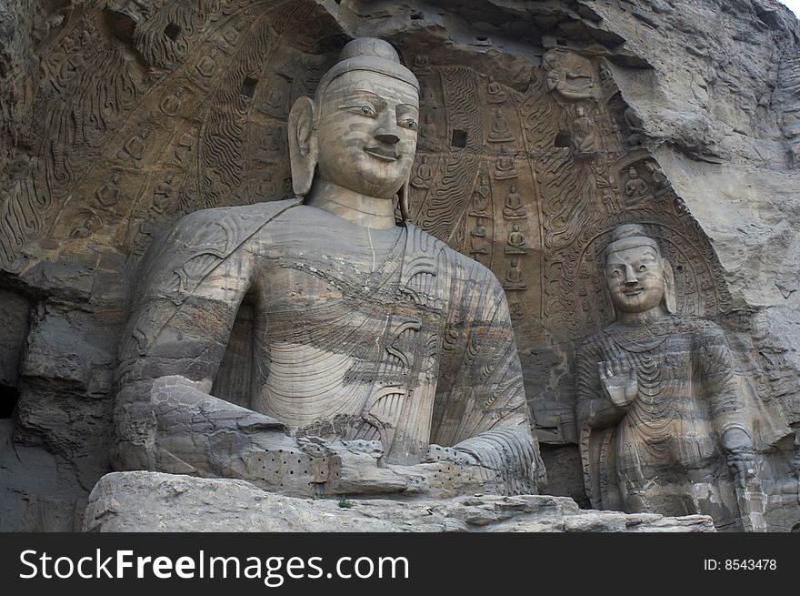 The buddha with exquisite carving and beautiful colors, in Yungang Grottoes, Datong, Shanxi province,  China. The buddha with exquisite carving and beautiful colors, in Yungang Grottoes, Datong, Shanxi province,  China.