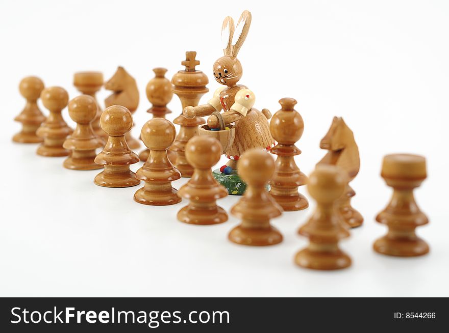 Chess figures with easter rabbit as queen and shallow depth of field. Chess figures with easter rabbit as queen and shallow depth of field