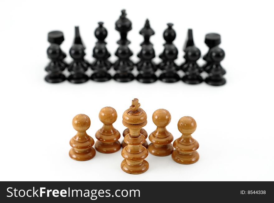 White king against oponent army and protected by five pawns, isolated on white background. White king against oponent army and protected by five pawns, isolated on white background