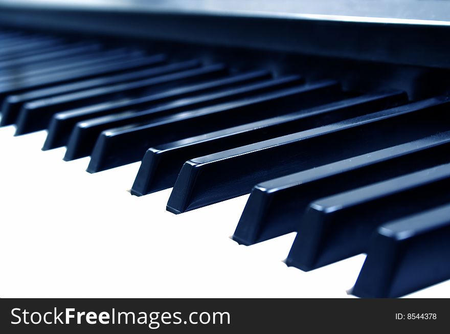 The keyboard of the old piano. The keyboard of the old piano