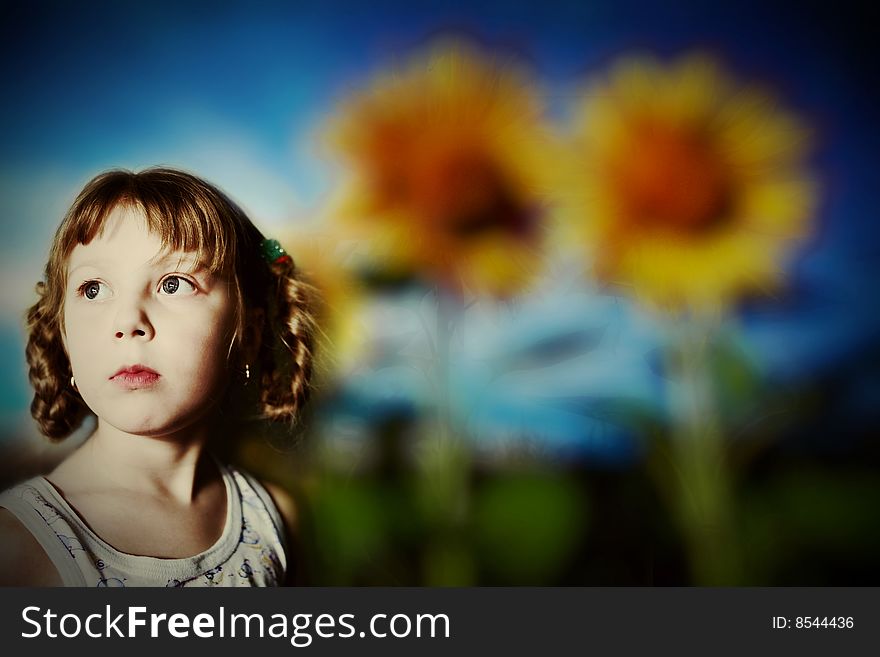 Girl and sunflowers