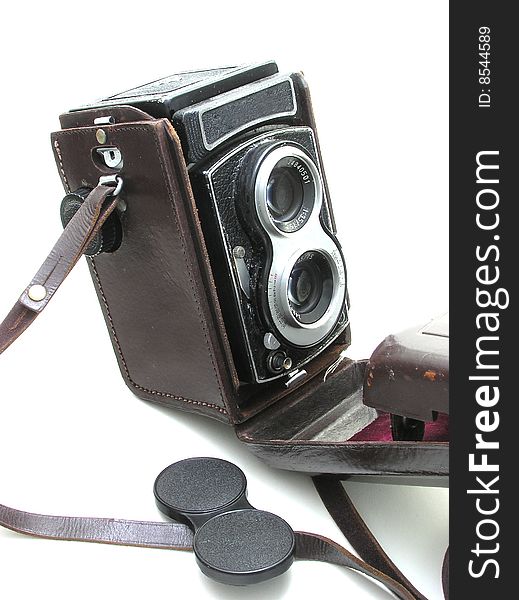 A 120mm film double lens camera over white background.