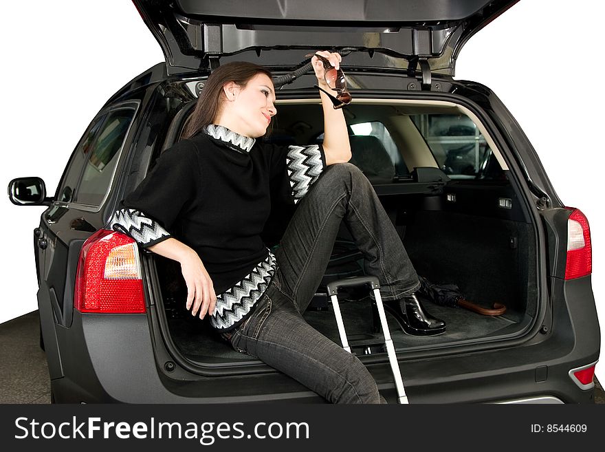 Pretty women sit in car boot. Pretty women sit in car boot