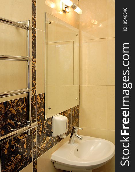 Luxury washroom in a hotel suite, with mirror. Luxury washroom in a hotel suite, with mirror