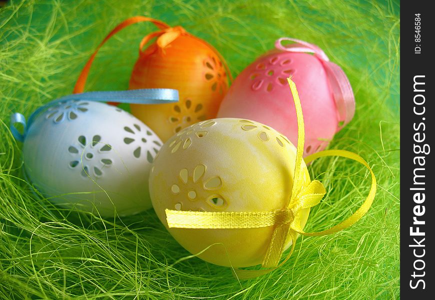 Easter still life, eggs on green background