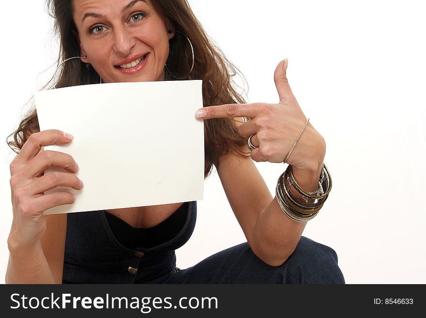 Young attractive woman in casual wear, holding a blank sheet of paper, free for a message (i.e. SALES, HELP WANTED, etc).
Isolated on white. Young attractive woman in casual wear, holding a blank sheet of paper, free for a message (i.e. SALES, HELP WANTED, etc).
Isolated on white