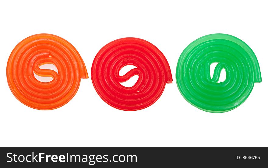 Colorful rolls of candy, isolated on a white background. Colorful rolls of candy, isolated on a white background