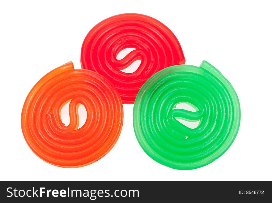 Colorful rolls of candy, isolated on a white background. Colorful rolls of candy, isolated on a white background