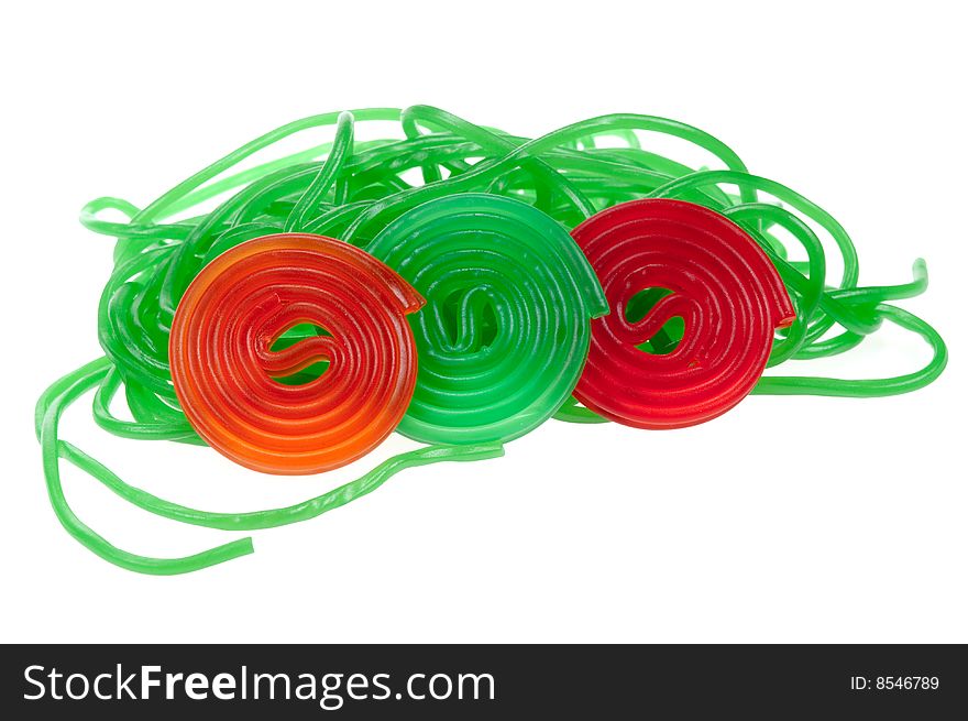 Colorful rolls of candy, isolated on a white background. Colorful rolls of candy, isolated on a white background