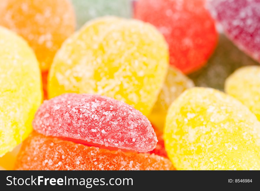 Close-up of fruit candy in many colors isolated on a white background. Close-up of fruit candy in many colors isolated on a white background