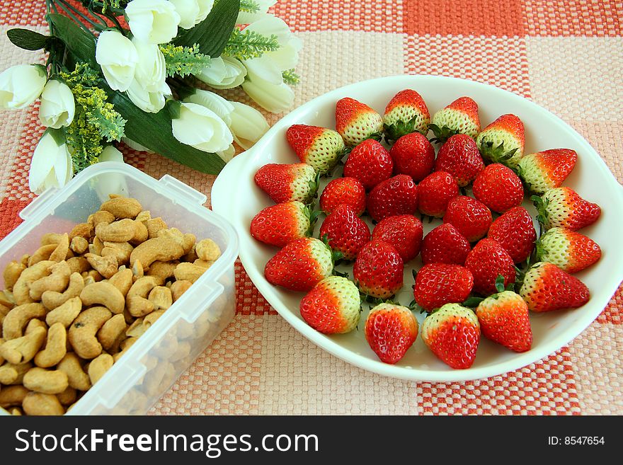 Healthy breakfast - cereal with white yogurt and with strawberries in saucer. Healthy breakfast - cereal with white yogurt and with strawberries in saucer