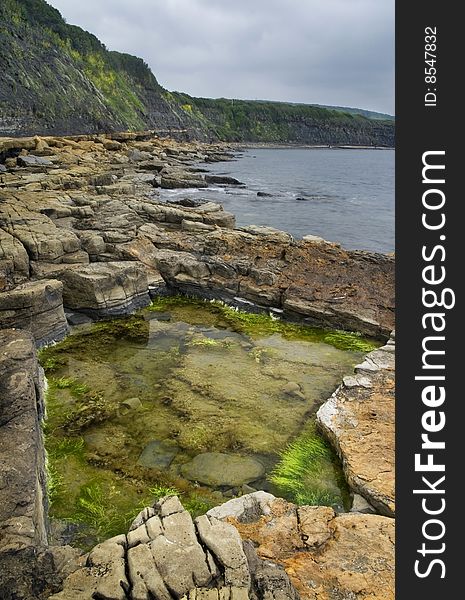 An star-shaped puddle at Kimmeridge Bay. An star-shaped puddle at Kimmeridge Bay