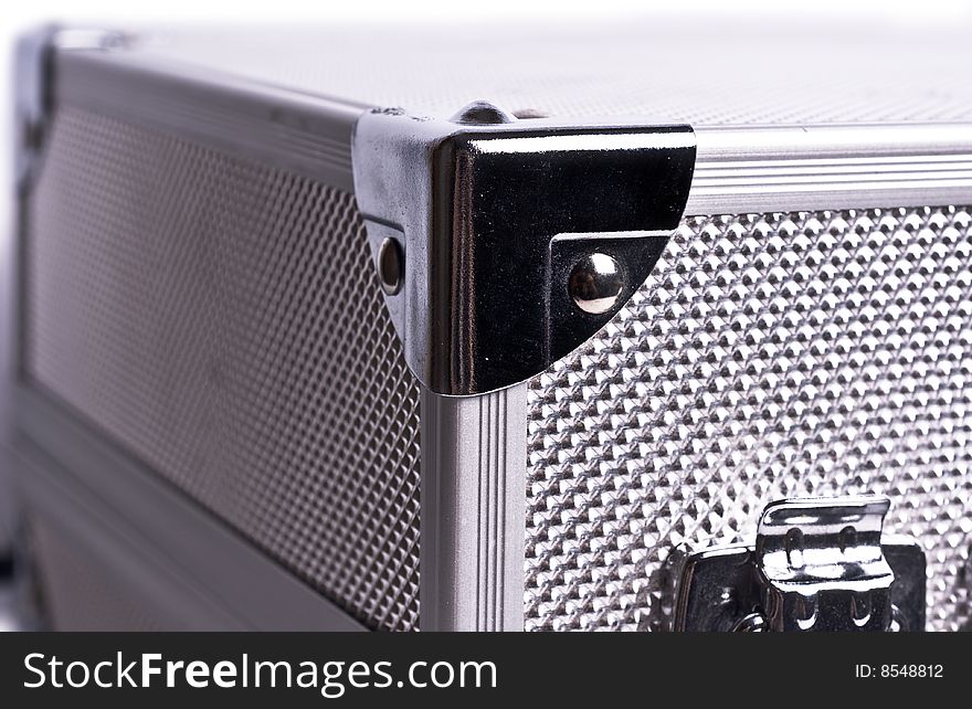 Metal suitcase on white background