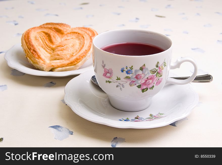 Cookies and a cup of tea on the table