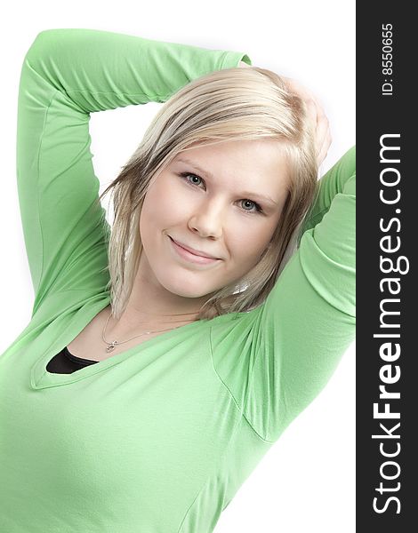 Isolated cute teenage girl in green shirt over white background