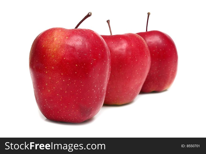 Ripe red apples isolated on white background