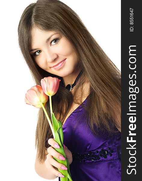 Portrait of a beautiful young woman with tulips in her hands. Portrait of a beautiful young woman with tulips in her hands