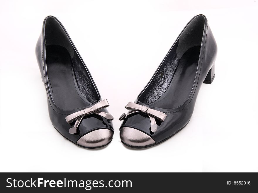 Black female shoes on a white background.