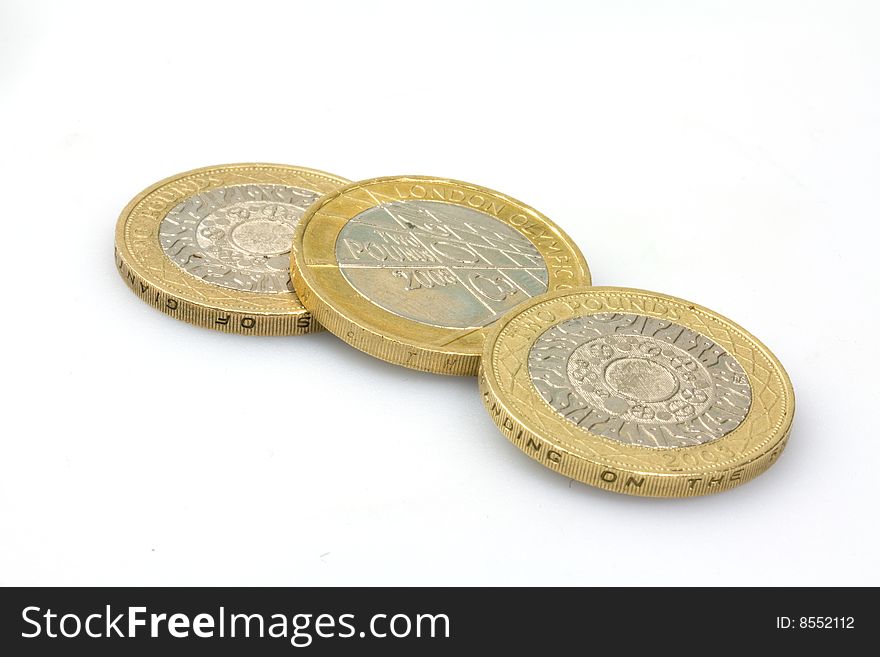 British two pound coins isolated on white. British two pound coins isolated on white